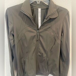 Womens Lululemon khaki workout jacket with pockets and zipper. Size 8